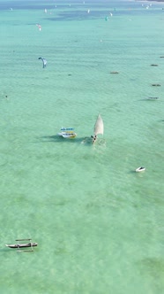 Vertical Video Boats in the Ocean Near the Coast of Zanzibar Tanzania