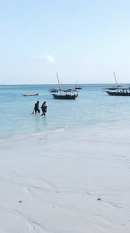 Vertical Video Boats in the Ocean Near the Coast of Zanzibar Tanzania