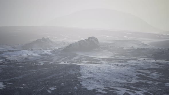 Antarctic Mountains with Snow in Fog