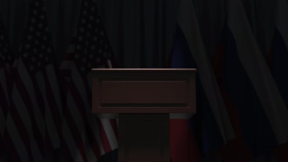 Row of Flags of Russia and the USA and and Speaker Tribune alt