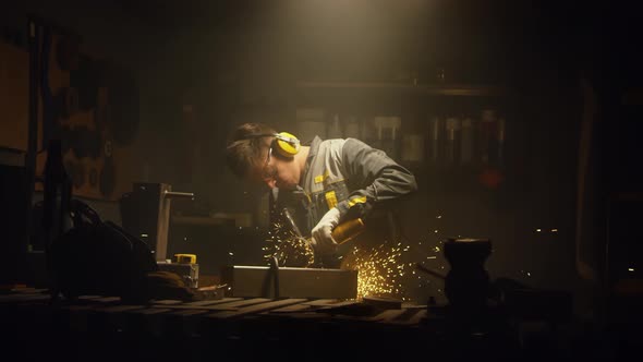 A man works with a circular saw