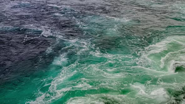 Waves of Water of the River and the Sea Meet Each Other During High Tide and Low Tide.