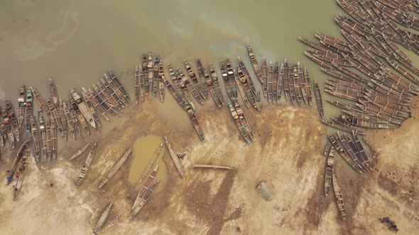 Aerial view of many Canoe docked along Rakti river, Bangladesh.