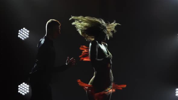 Elements of Fiery Latin American Dance Performed By Ballroom Dancers