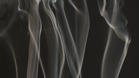 incense smoke on dark background