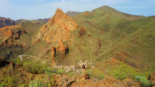 Beautiful Slim Woman Relaxing in Hike to Gorge