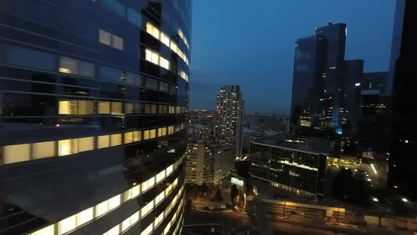 Aerial View of Modern City Business District at Sunset Sky