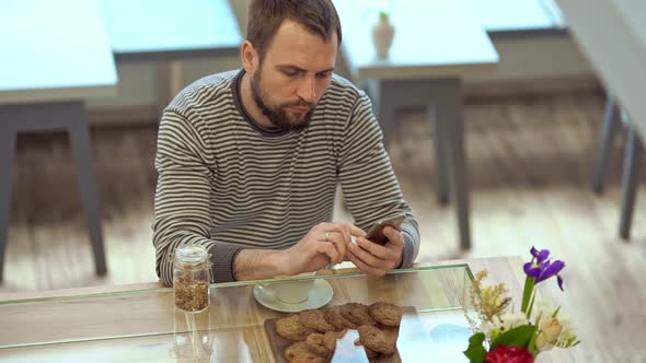 Man Drinking Coffee and Thinking