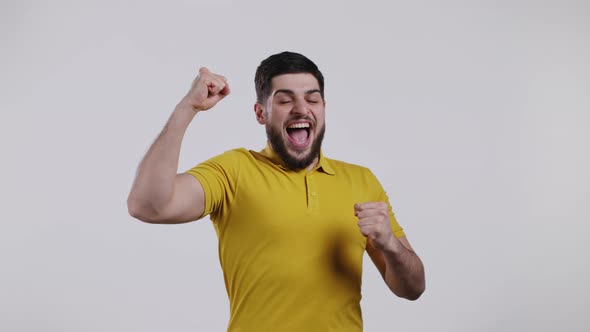 Man is Very Glad and Happy He Shows Yes Gesture of Victory Guy Achieved Result Goals