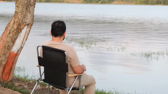 Man Watching Lake View