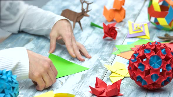 Man at Origami Folding Lesson