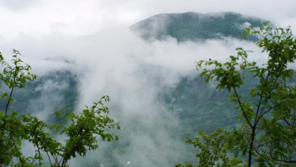 Timelapse Green Mountain and Moving Clouds