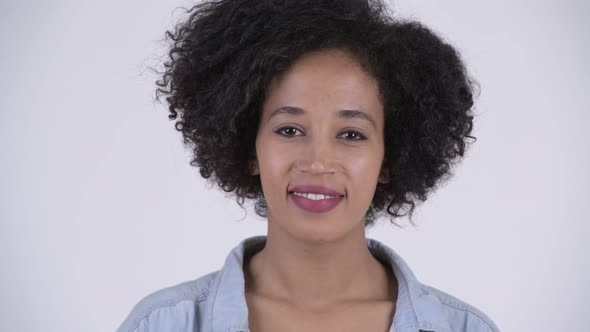 Face of Young Happy African Woman with Afro Hair Smiling