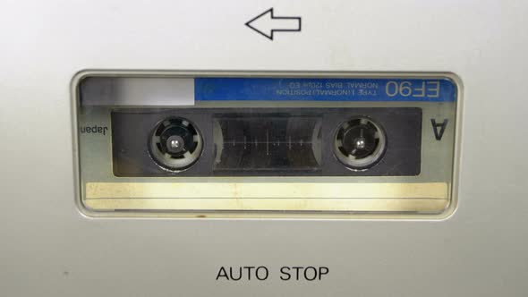 Tape Recorder Plays Audio Cassette Inserted Therein. Vintage Audio Tape