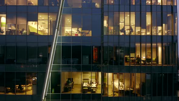 Windows of Offices at Night Aerial View Closeup