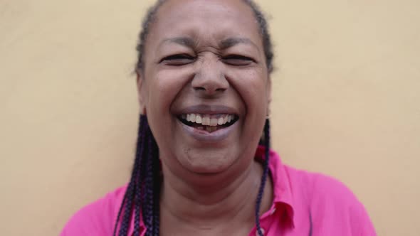 Authentic Shot of Happy African Senior Woman Smiling on Camera