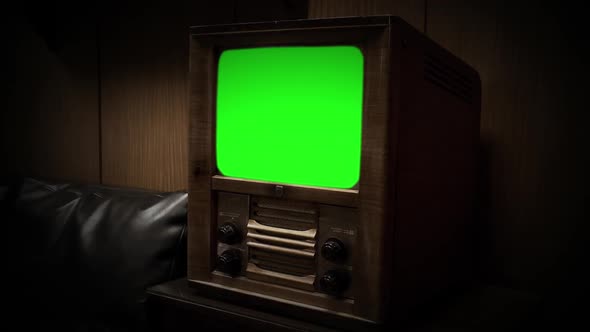 Vintage Television with Green Chroma Key Screen. Aesthetics of the 50s or 40s.