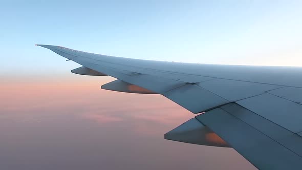Flying Airplane Wing From Window View.