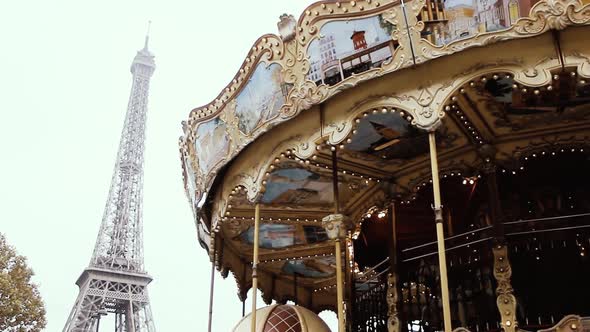 Carousel and Eiffel tower in Paris, France.