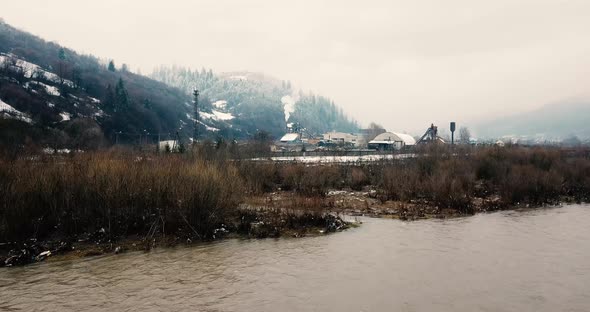 A Chemical Industry That Pollutes a Mountain River