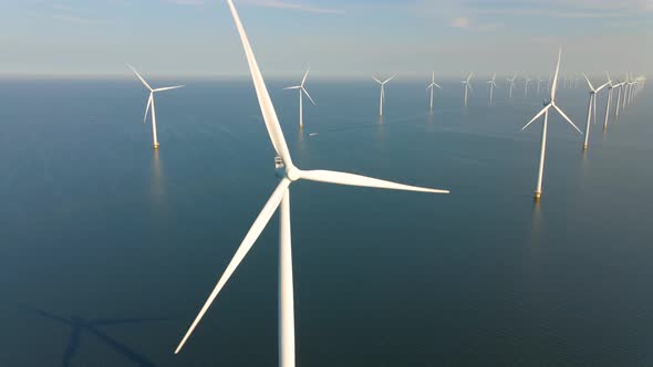 Huge Windmill Turbines Offshore Windmill Farm in the Ocean Westermeerwind Park Windmills Isolated at