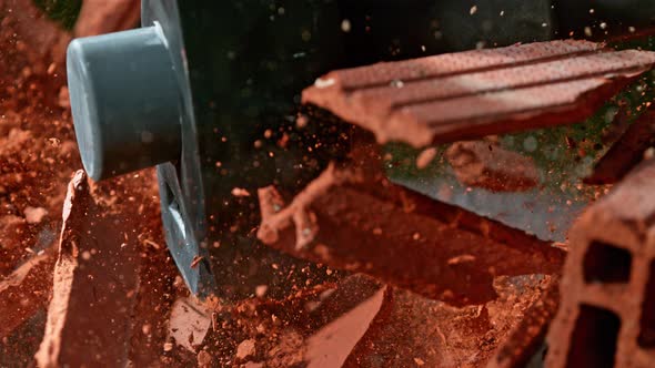 Super Slow Motion Detail Shot of Smashing Brick with Sledgehammer at 1000Fps