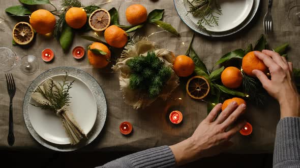 Woman Decorating Festive Table