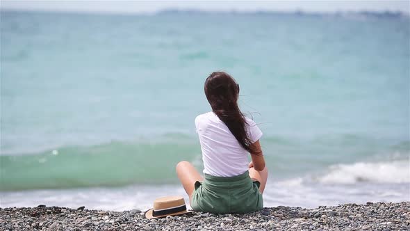 Young Beautiful Woman Relax on the Beach