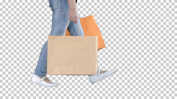 Cheerful school girl walking with shopping bags, Alpha Channel