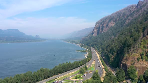 Aerial flying above Interstate 84 freeway and the Columbia River Gorge.