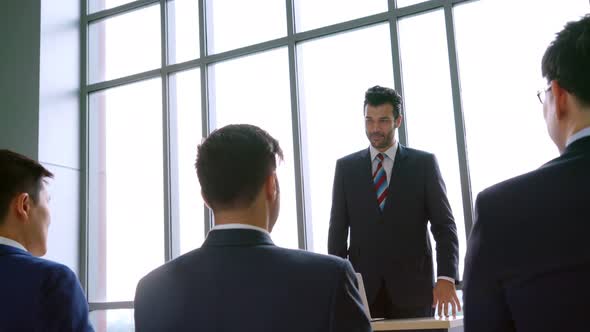 Group of Business People Meeting in a Seminar Conference