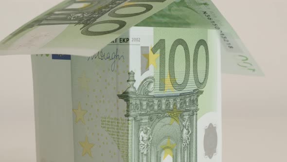 Slow tilt real estate metaphor of EU paper money 4K 2160p 30fps UHD  footage - Close-up of hundred E