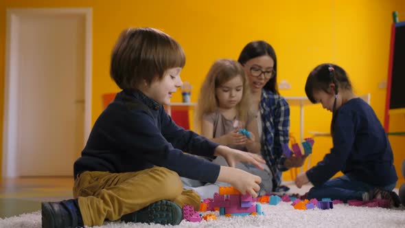 Joyful Children Enjoying Leisure in Kindergarten