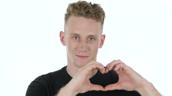 Heart Shape By Young Man on White Background