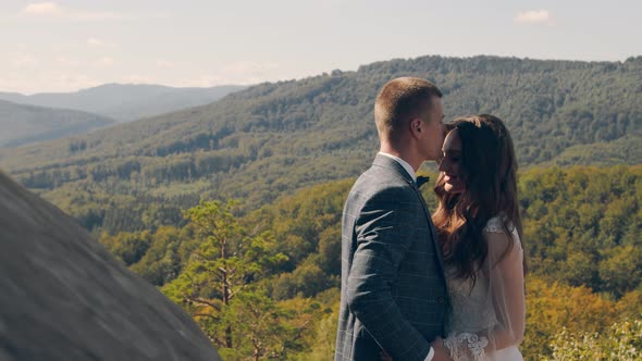 Newlywed Wedding Couple Walking in the Park