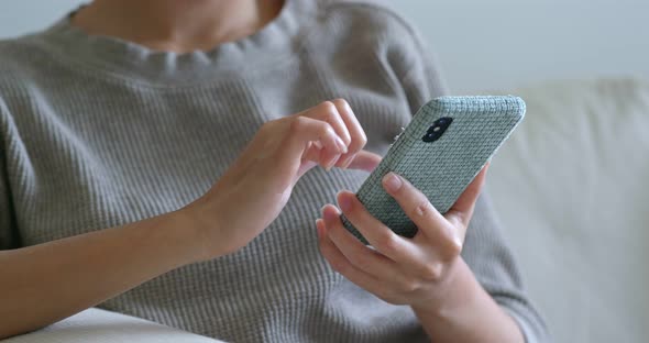 Woman check on mobile phone 