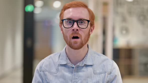 Portrait of Attractive Businessman Feeling Shocked, Surprised 