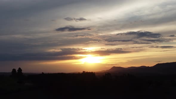 Sunset at farming landscape at countryside rural scenery.