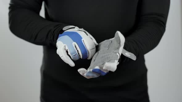 Close Up Goalkeeper Holding Soccer Ball in the Stadium Studio Football Player Hands Professional