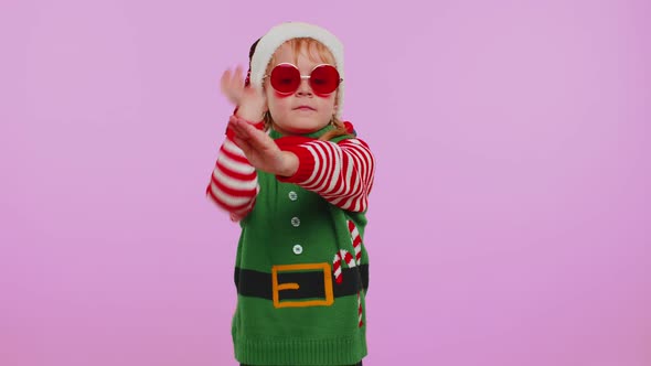 Girl Christmas Santa Claus Elf Listening Music Via Earphones Dancing Disco Fooling Around Having Fun