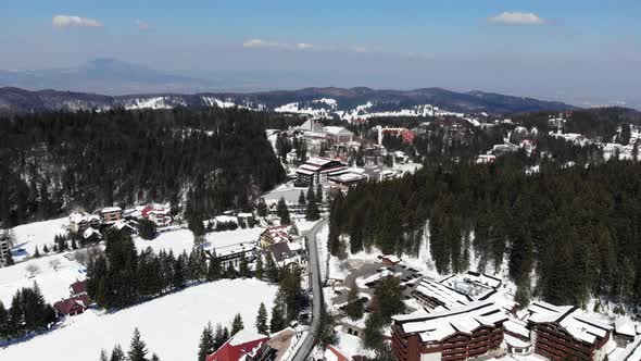 Aerial view of the famous Poiana Brasov ski resort in Romania covered in snow