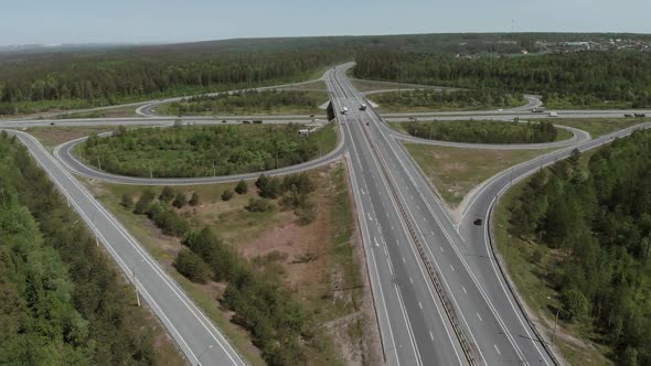 Aerial View of White Truck Passing Busy Highway Overpass/ Overdrive/ Bridge. 