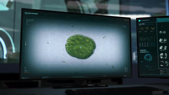 Innovative Microscope Interface Conducts Research Of Green Microbe Division