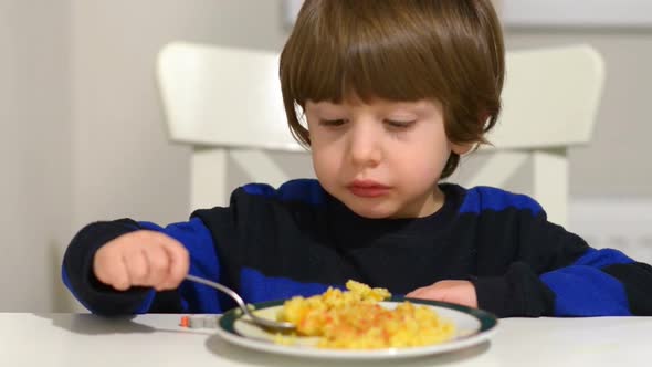 Little Boy Eating Pilaff