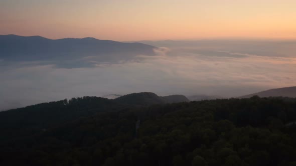 Aerial view of a foggy valley at Transylvania