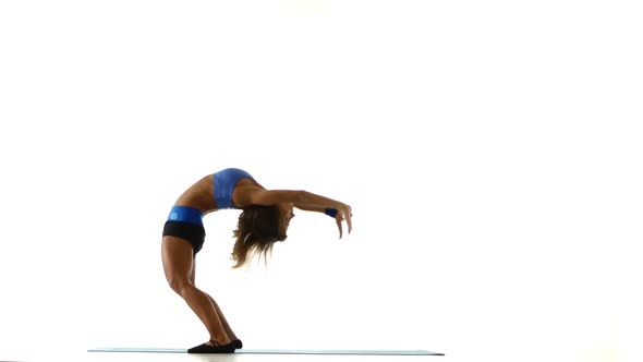 Gymnast Doing Bridge on the Floor