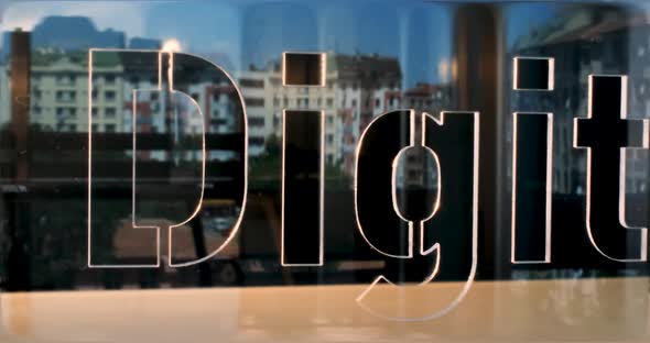 Glass Digital Letters and Office in Background