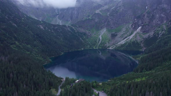 view of the blue mountain lake from a quadcopter morskie oko landmark of poland tatras buried europe