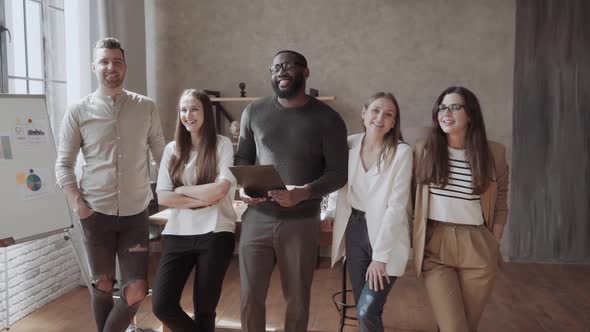 Group Of Successful Multi Ethnic Businesspeople In Casual Standing Together