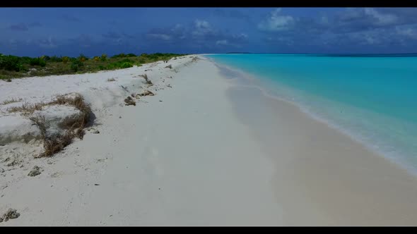 Aerial drone view landscape of beautiful tourist beach voyage by blue sea and white sandy background